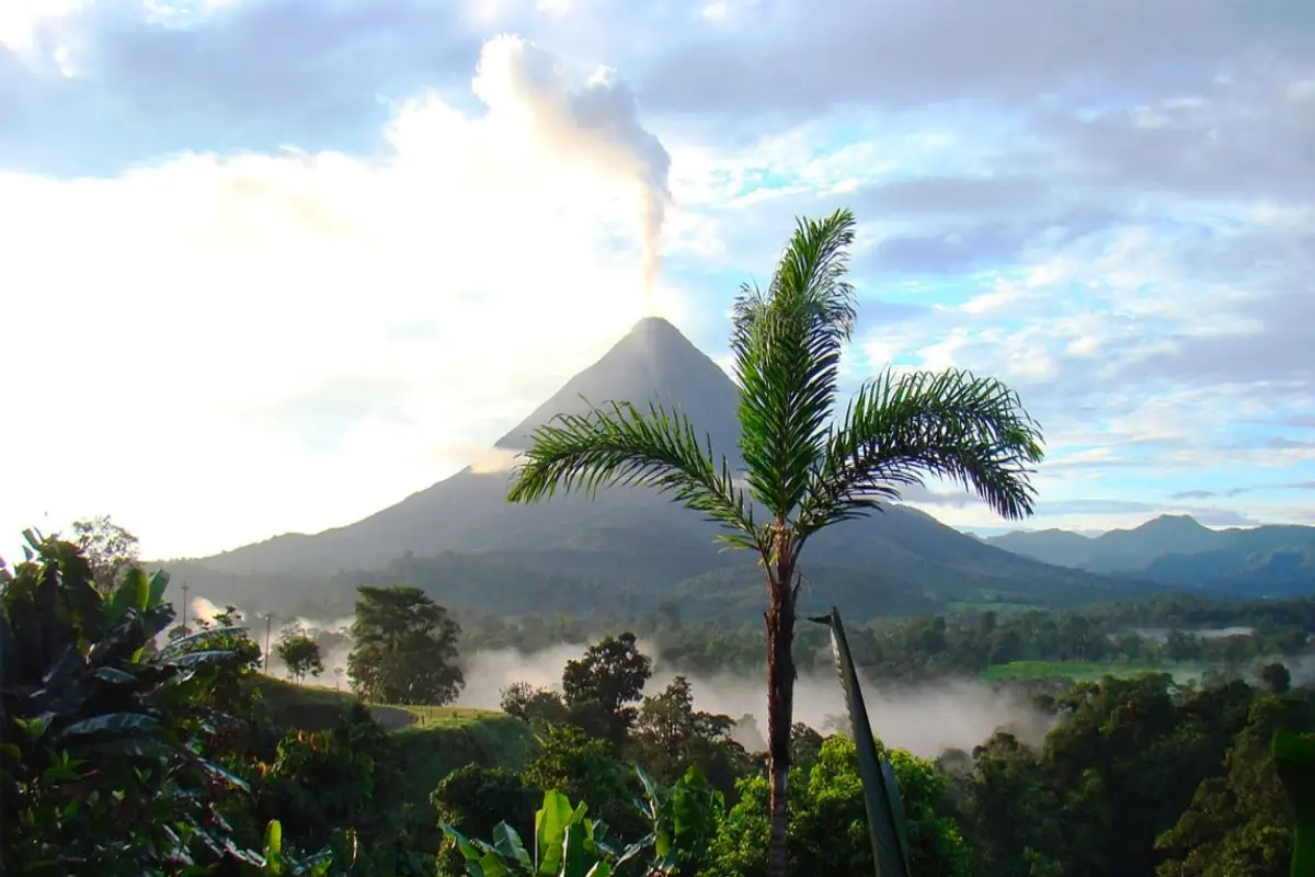 Arenal Volcano is surrounded by lush rainforests in Costa Rica.