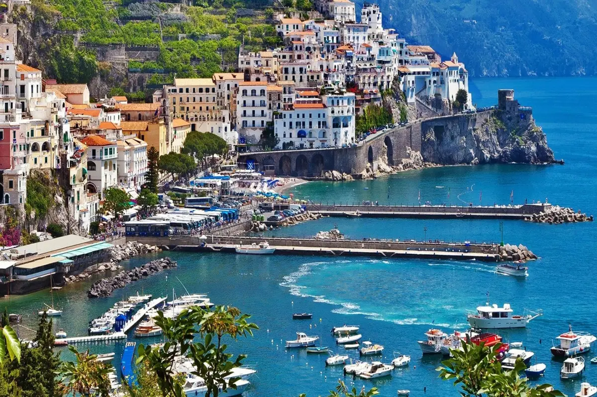 Amalfi blends centuries of maritime history with colorful architecture, charming piazzas, scenic beaches, and unforgettable Italian culture.