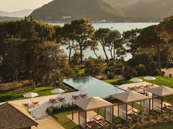 Aerial view of the luxury swimming pool and private lounge cabanas at the Four Seasons Resort Mallorca at Formentor, Spain.