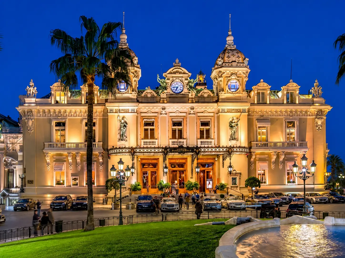 The historic Belle Epoque facade and grand domes of the Casino de Monte Carlo, Monaco on the French Riviera.