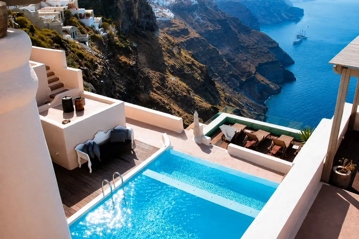 Private villa featuring an infinity-edge pool overlooking the caldera in Santorini, Greece.