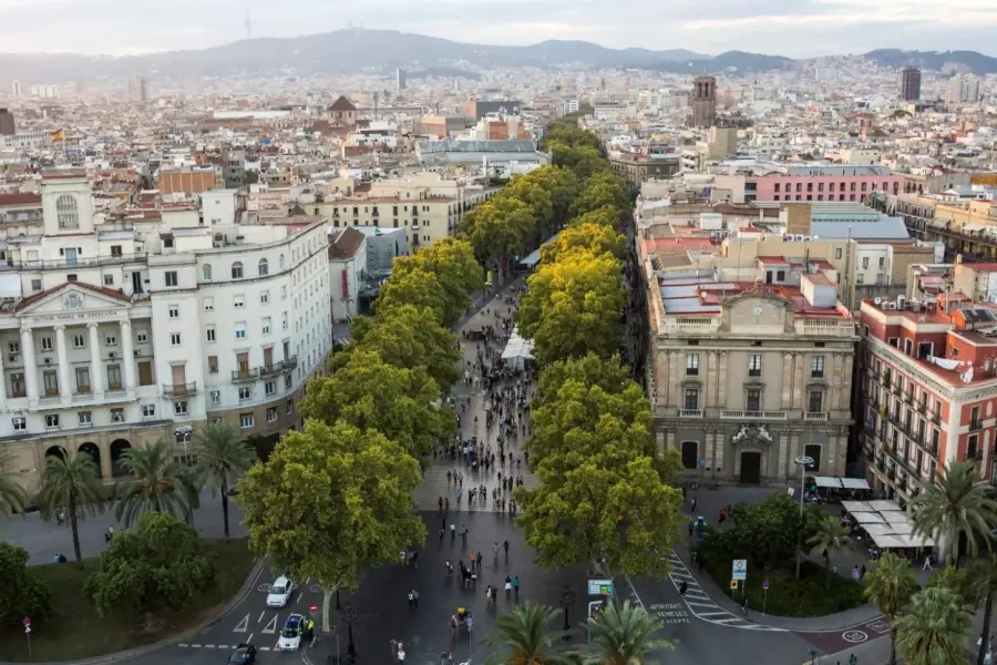 At the heart of Barcelona, La Rambla unfolds as a vibrant, tree-lined promenade where the city’s energy is always in motion.