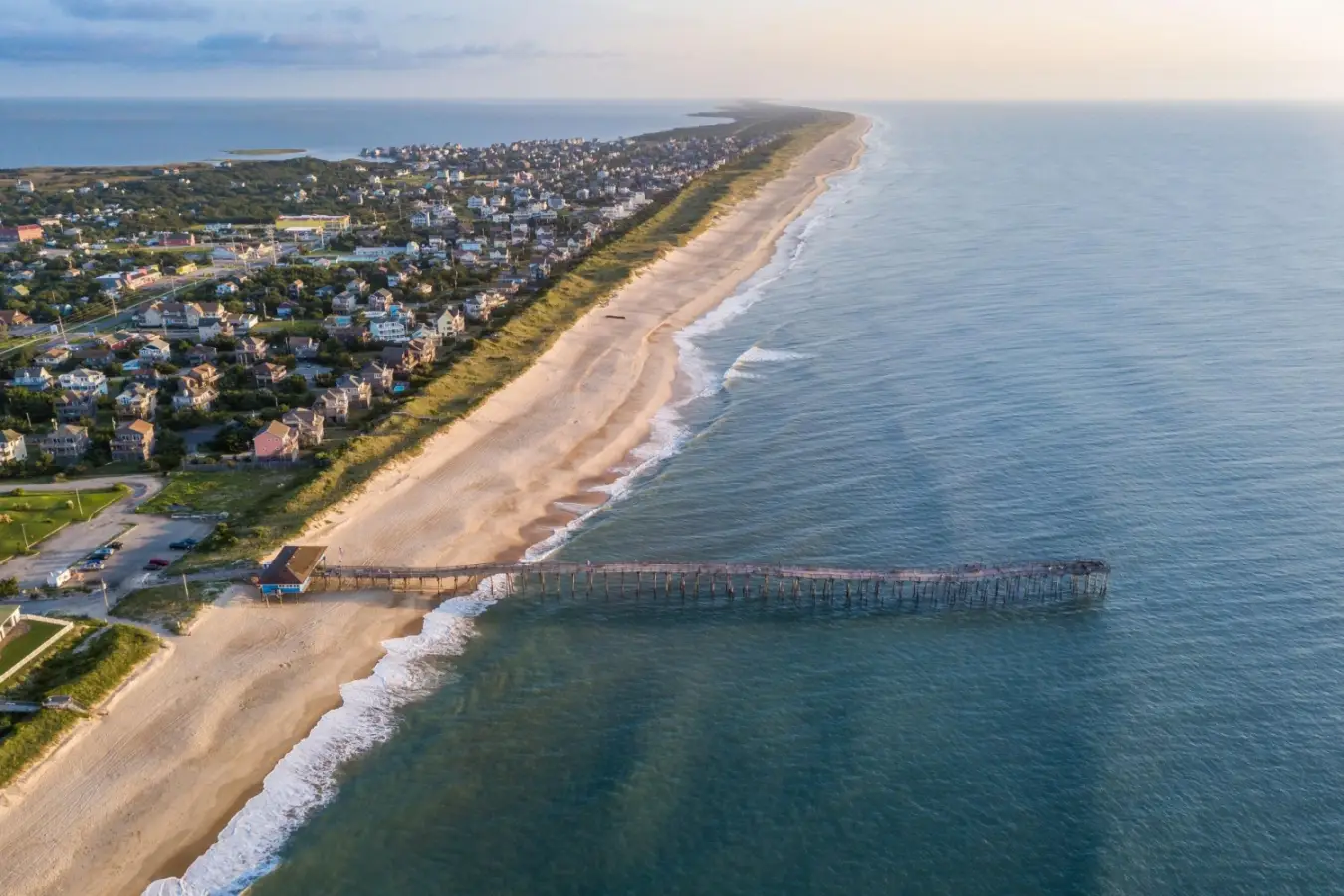 Aerial view of the Avon Fishing Pier located on Hatteras Island in the Outer Banks of North Carolina.