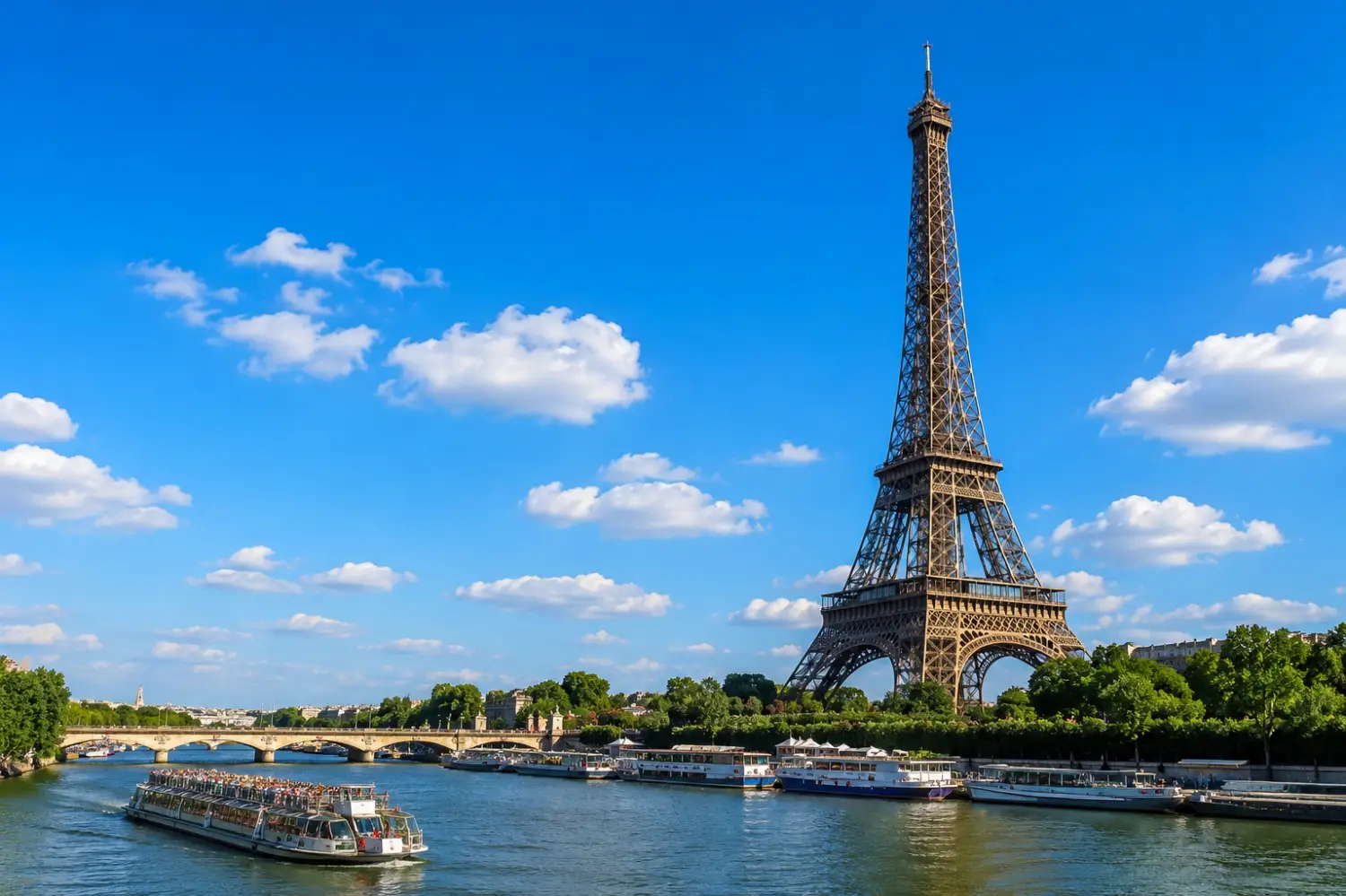 The iconic Eiffel Tower standing tall against a clear blue sky, a symbol of romance in Paris.