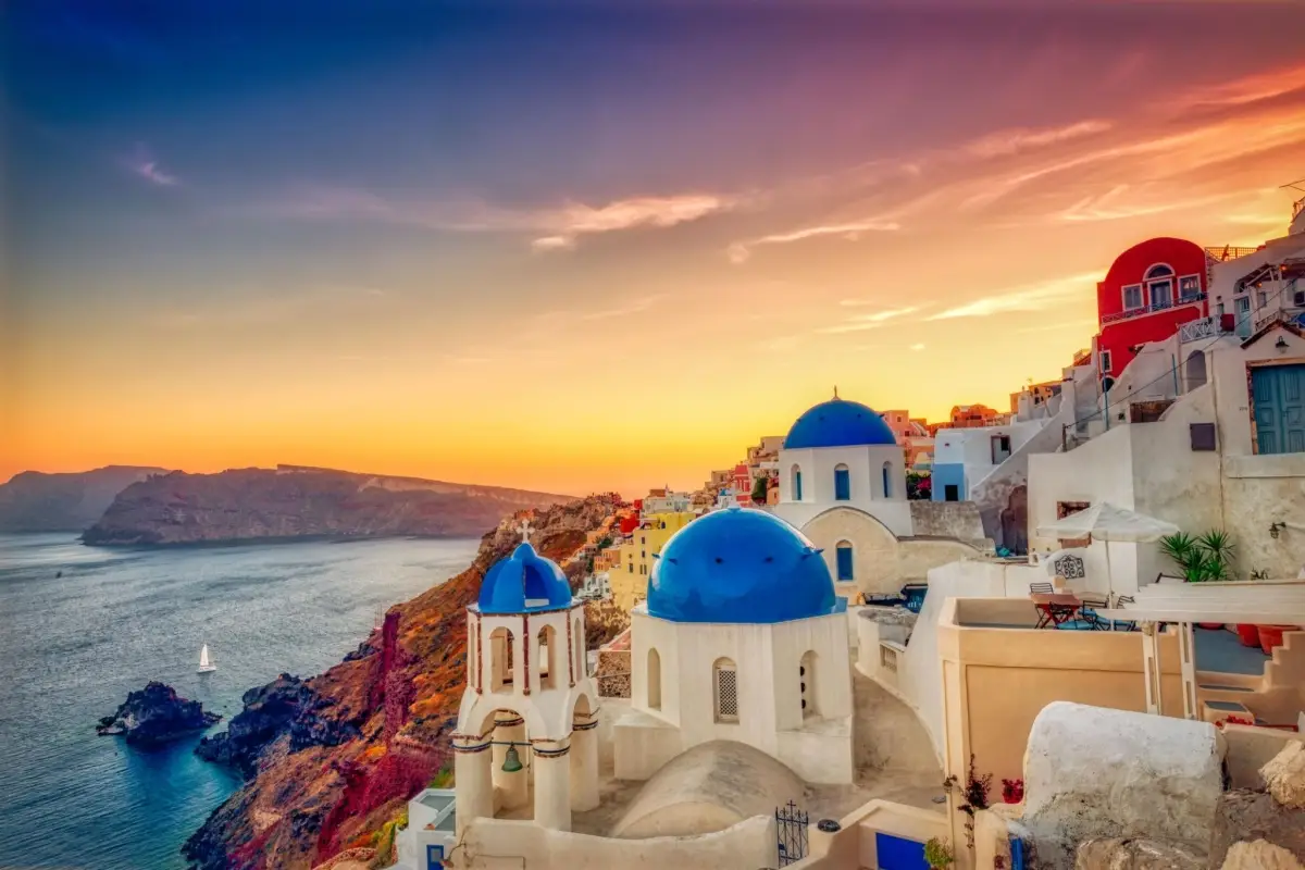 Oia sunset views are unmatched—discover the best photo spots around the famous blue domes in our latest travel guide.
