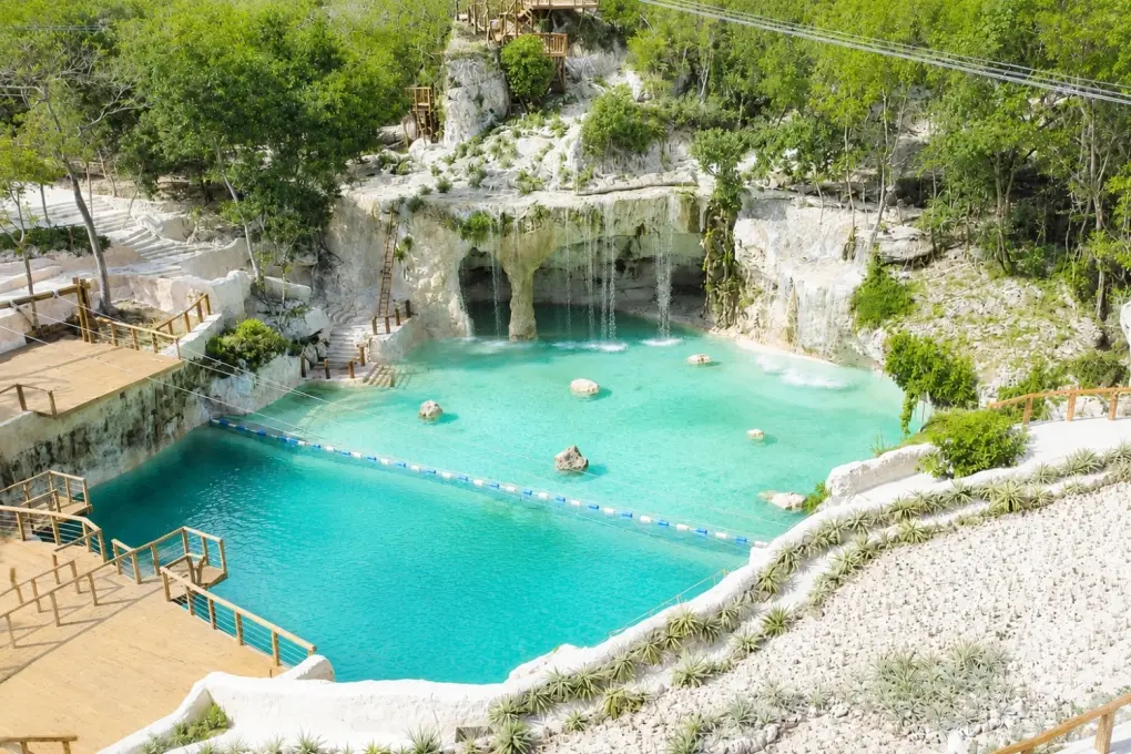 Scape Park cenote pool and cascading waterfalls at Saltos Azules in Cap Cana, Dominican Republic.