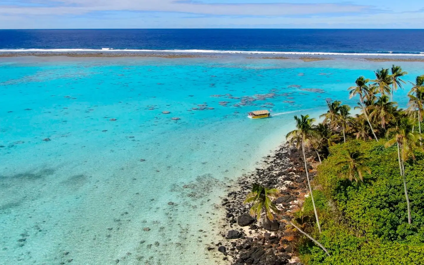 Taakoka islet (Motu Taakoka), located in the clear turquoise waters of Muri lagoon on the island of Rarotonga, Cook Islands.