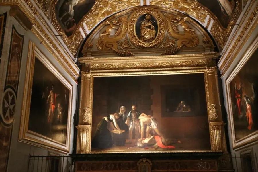 The Beheading of Saint John the Baptist by Caravaggio inside the ornate Oratory of St. John's Co-Cathedral in Valletta, Malta.
