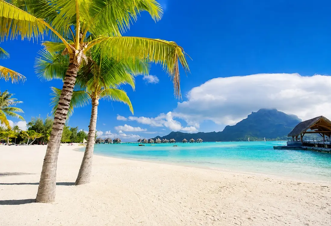 Bora Bora is famous for its white sand beaches, palm trees, turquoise lagoons, luxury resorts and overwater bungalows.
